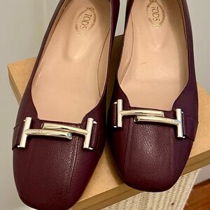 Tod's Burgundy Leather Flats with Gold Accent